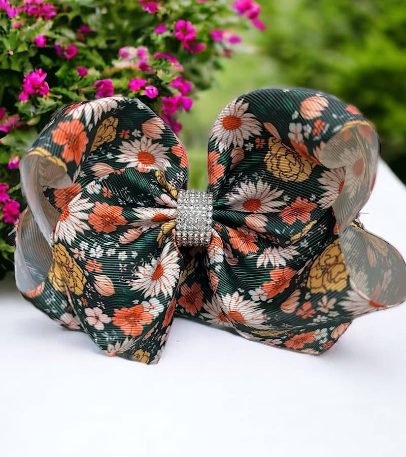 FLORAL HAIR BOW W/ RHINESTONES.