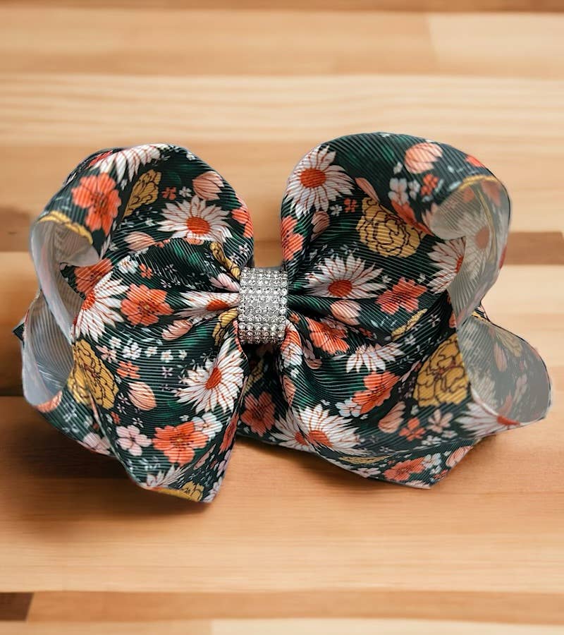 FLORAL HAIR BOW W/ RHINESTONES.